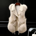 Ivory cream faux-fur gilet with oversized lapel and belted waist, front view