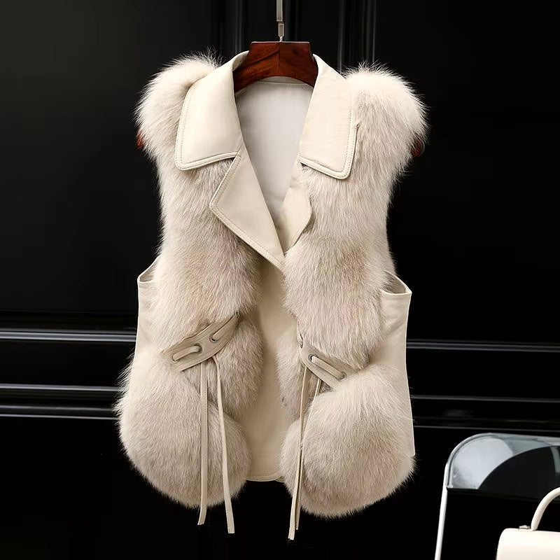 Ivory cream faux-fur gilet with oversized lapel and belted waist, front view