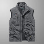 Bodywarmer vest layered over a shirt outdoors