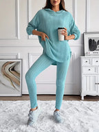 Ribbed knit two-piece lounge set with vertical ribbing, side view