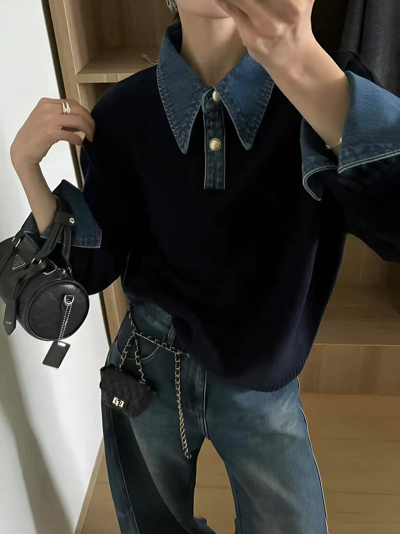Panel lapel sweater in black with a two-in-one layered front and metal buttons, front view.