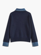 Panel lapel sweater in light grey with a two-in-one layered front and metal buttons, front view.