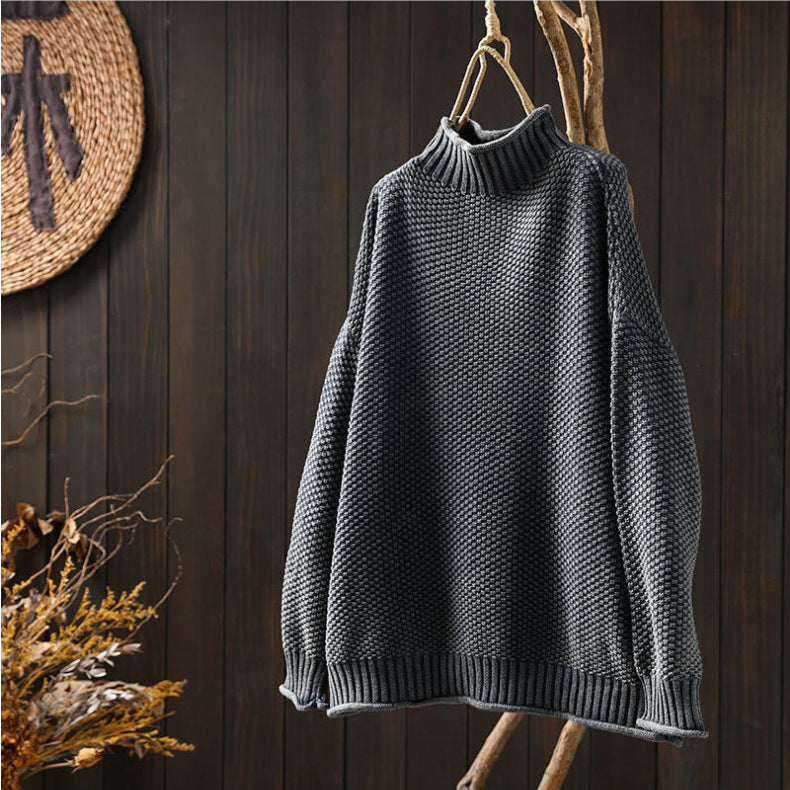Classic turtleneck knit sweater.