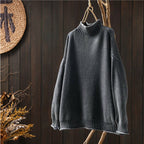 Classic turtleneck knit sweater.