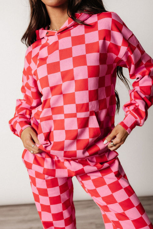 Pink and red checkered oversized hoodie, front view