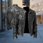 Leather-look jacket detail showing the front zip and zipped side pockets