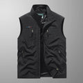 Bodywarmer vest with standing collar worn outdoors on a trail
