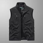 Bodywarmer vest with standing collar worn outdoors on a trail