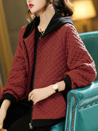 Quilted zip-up hoodie with contrast cuffs, three-quarter view