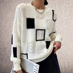 Eco-friendly knit sweater, styled view showing the timeless hip-length silhouette