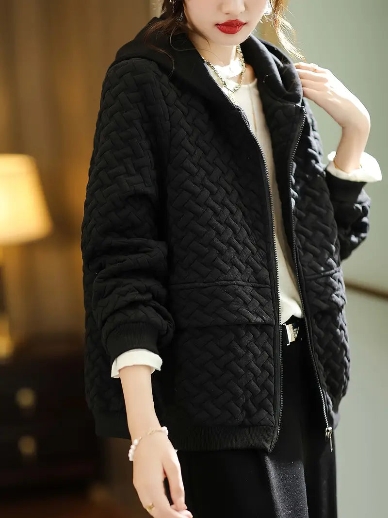 Black quilted hoodie with basketweave pattern and zip-up front, front view