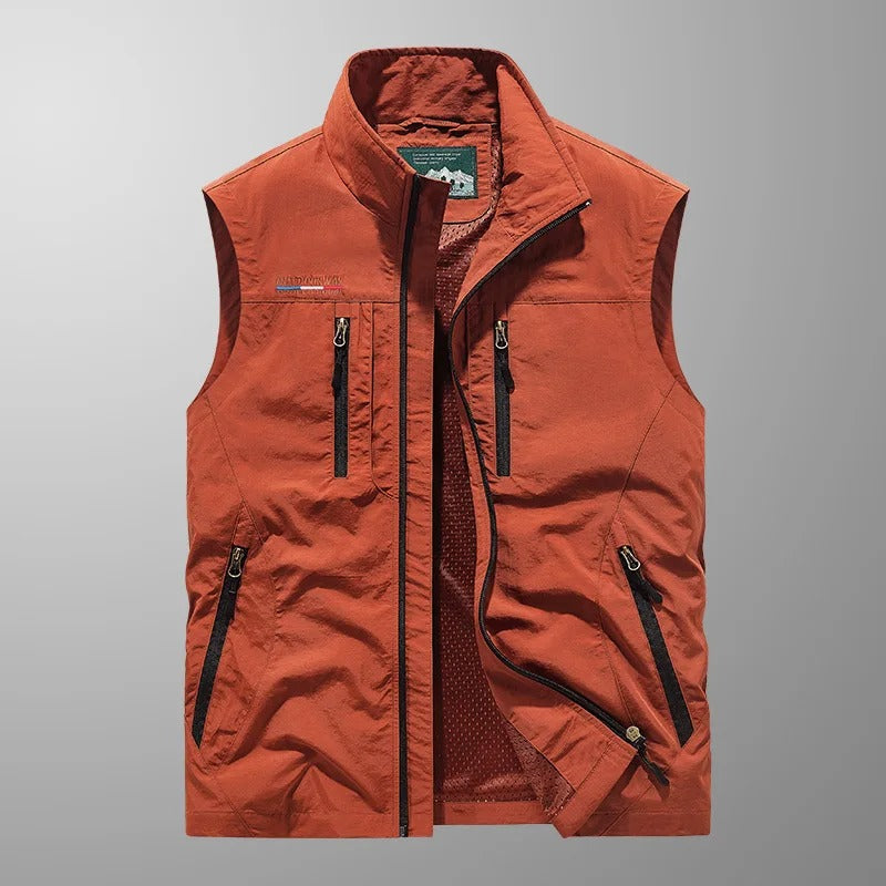 Bodywarmer vest with standing collar zipped up outdoors