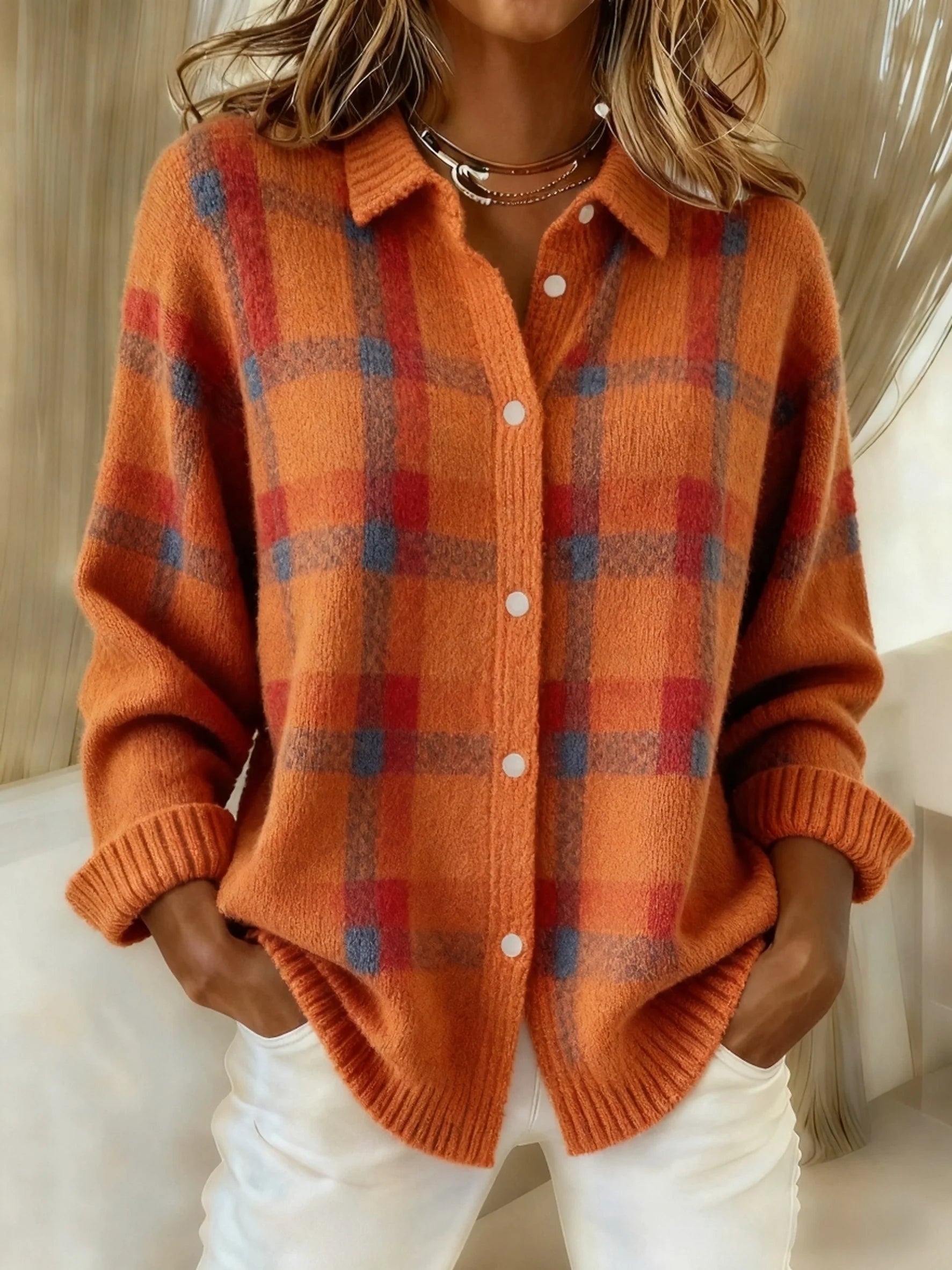 Checked pattern knit sweater.