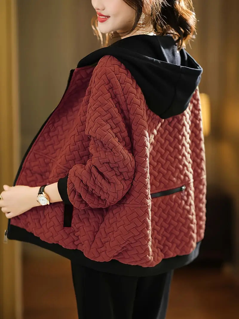Terracotta quilted hoodie with basketweave pattern and black hood, front view