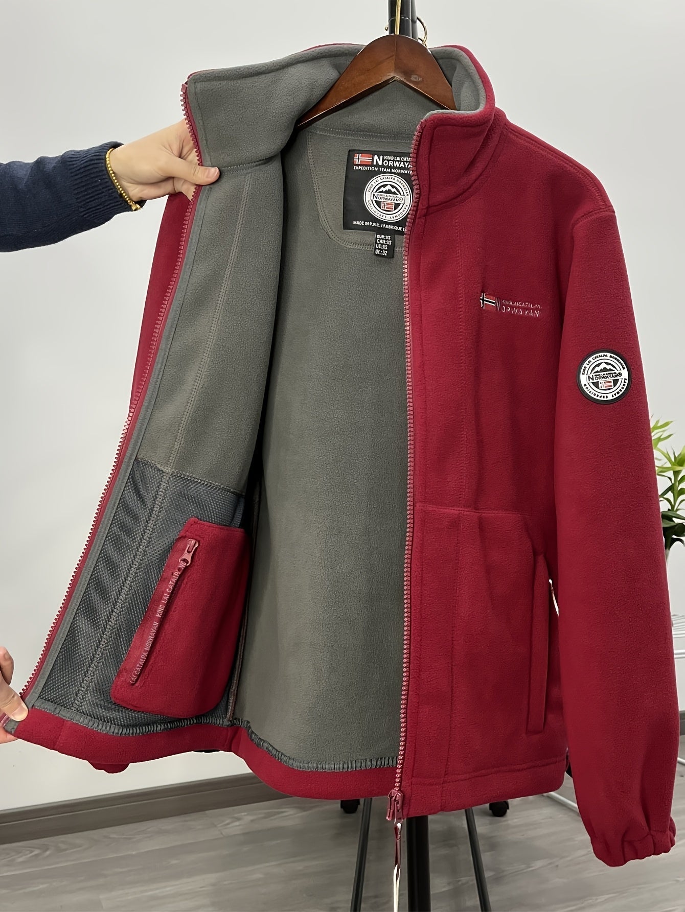 Fleece jacket high collar outdoor in navy, red, khaki, grey and black, collar detail.