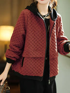 Quilted basketweave hoodie worn open over a layering tee, front view