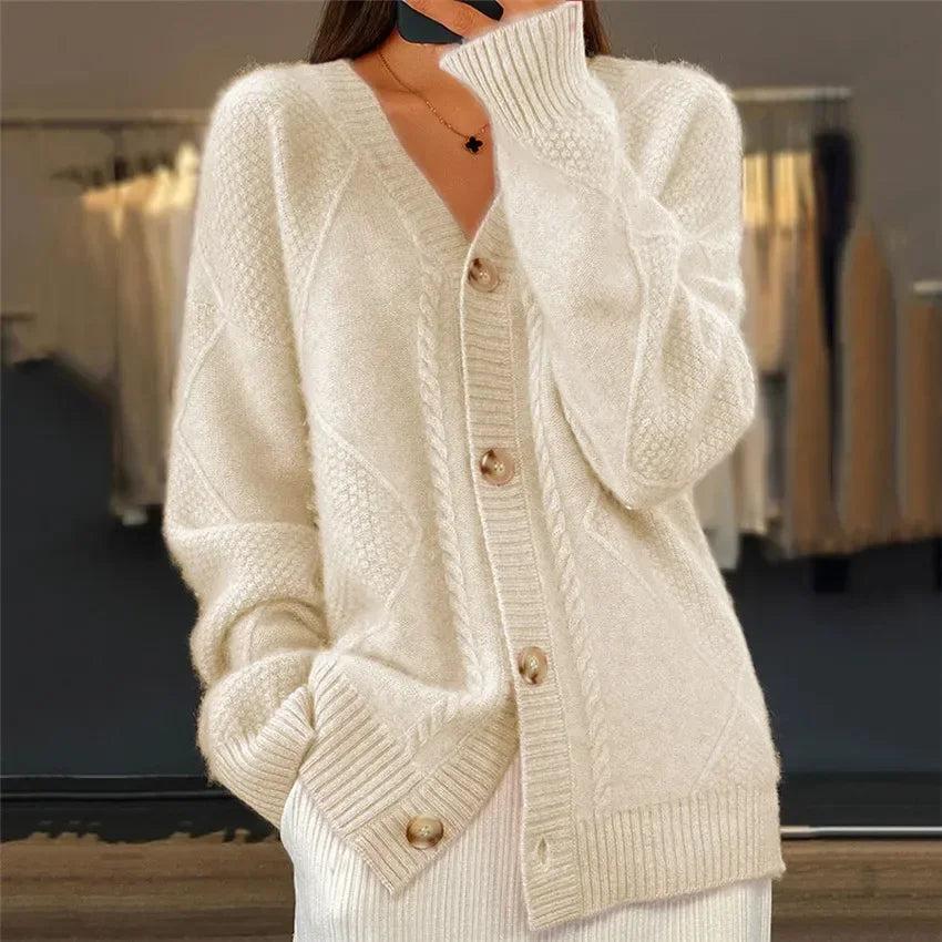 Soft knit button-front cardigan styled open over a simple everyday outfit