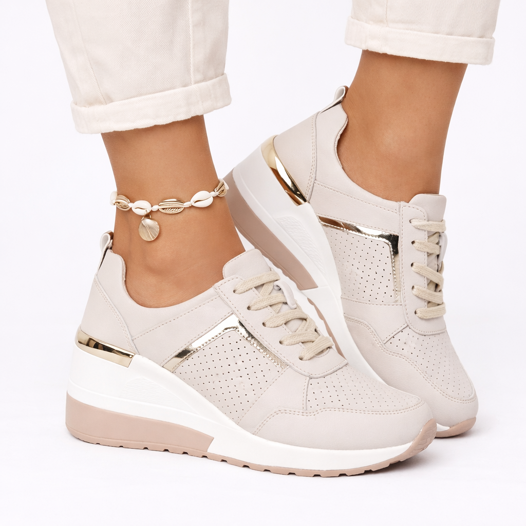 Orthopedic shoes with wedge sole in gold, breathable lace-up upper, side view.