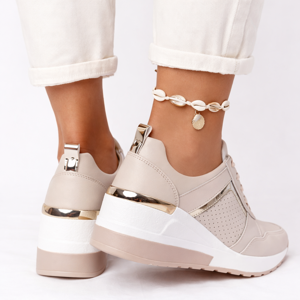 Orthopedic shoes with wedge sole, close-up of the breathable upper and cushioned lace-up detail.