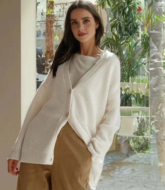 Gray soft knit cardigan with V-neck and button front, relaxed fit layering piece