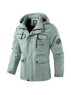 Waterproof winter jacket with adjustable hood in light green, front view