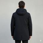 Black waterproof winter jacket styled with jeans and boots