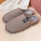 Slippers with soft lining and sturdy sole, close-up of sole and lining