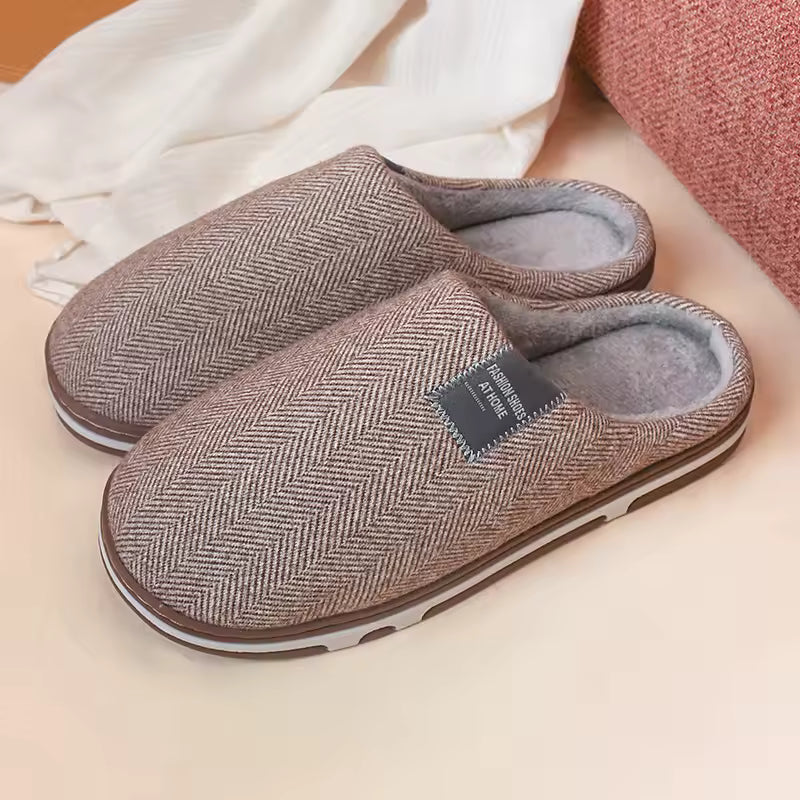 Slippers with soft lining and sturdy sole, close-up of sole and lining