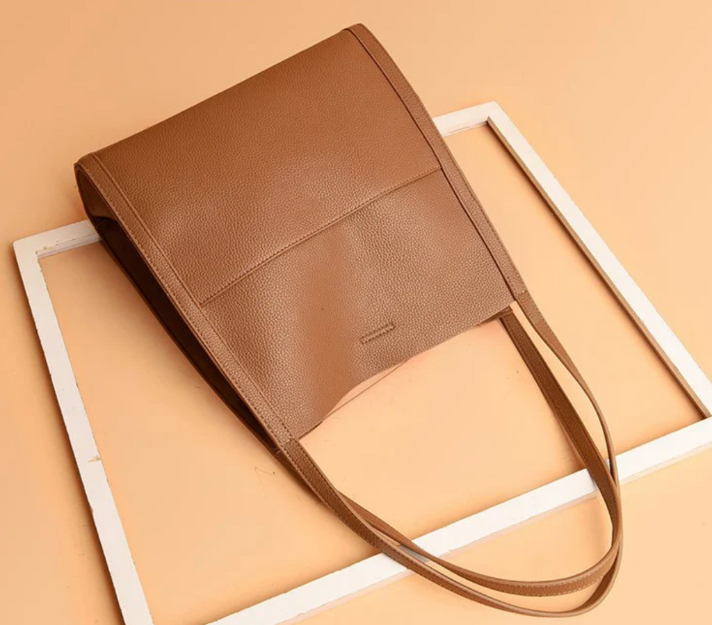 Leather-look shoulder bag interior with spacious zip organizer compartment