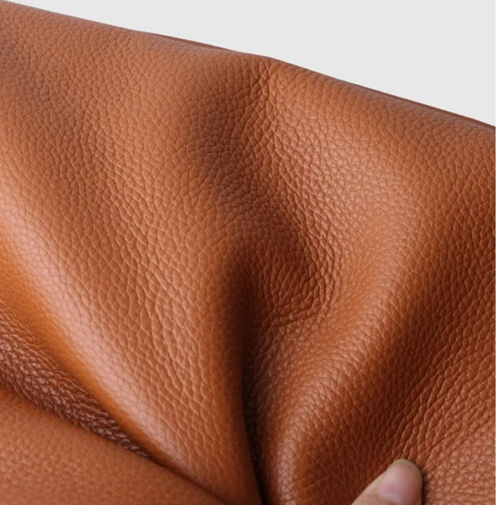 Leather-look shoulder bag external slip pocket detail