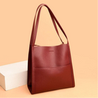Leather-look shoulder bag pebbled texture close-up