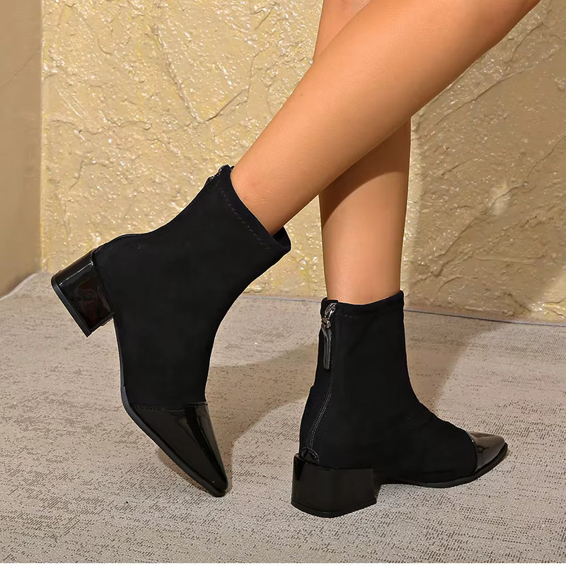 Suede-look ankle boots with block heel styled with tailored trousers