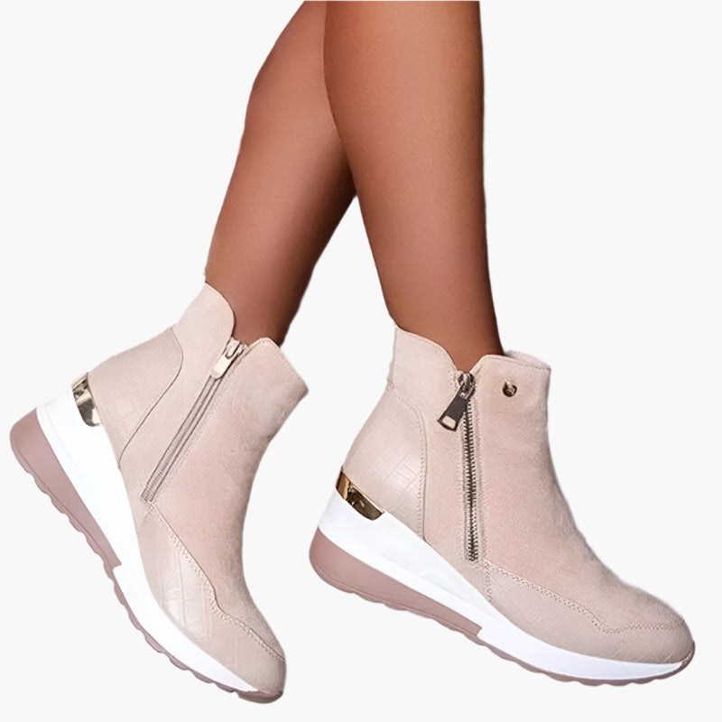 Beige orthopedic ankle boots with wedge sole and side zip, side view