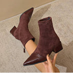 Suede-look ankle boots with block heel and patent detail, close-up view