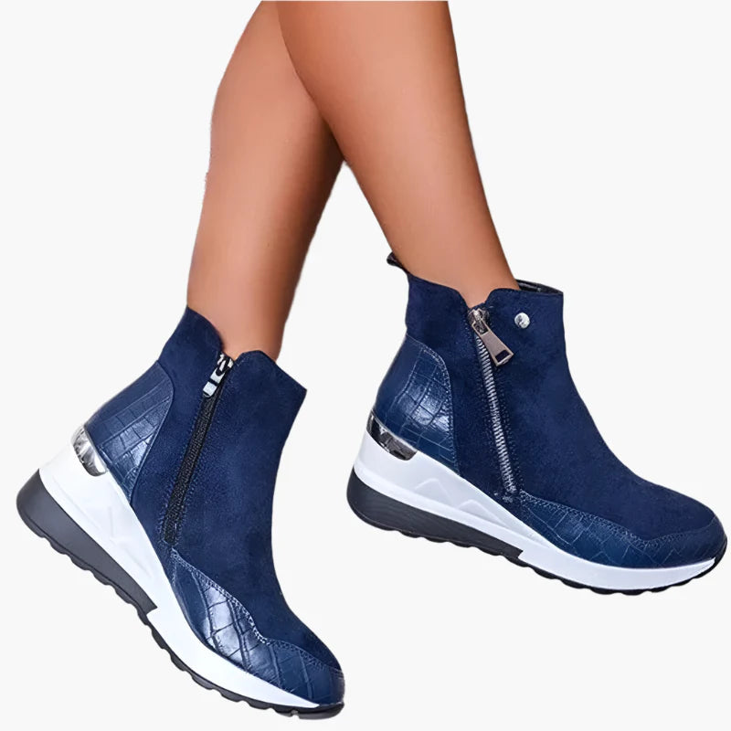 Beige orthopedic ankle boots detail showing side zip closure and shaft