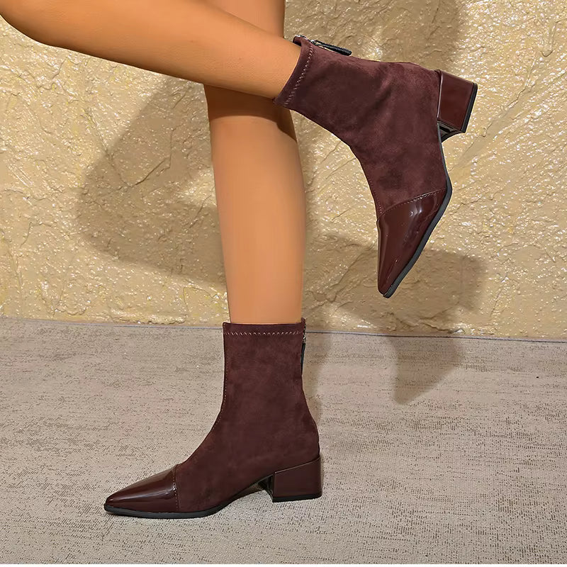 Suede-look ankle boots with block heel shown at an angle