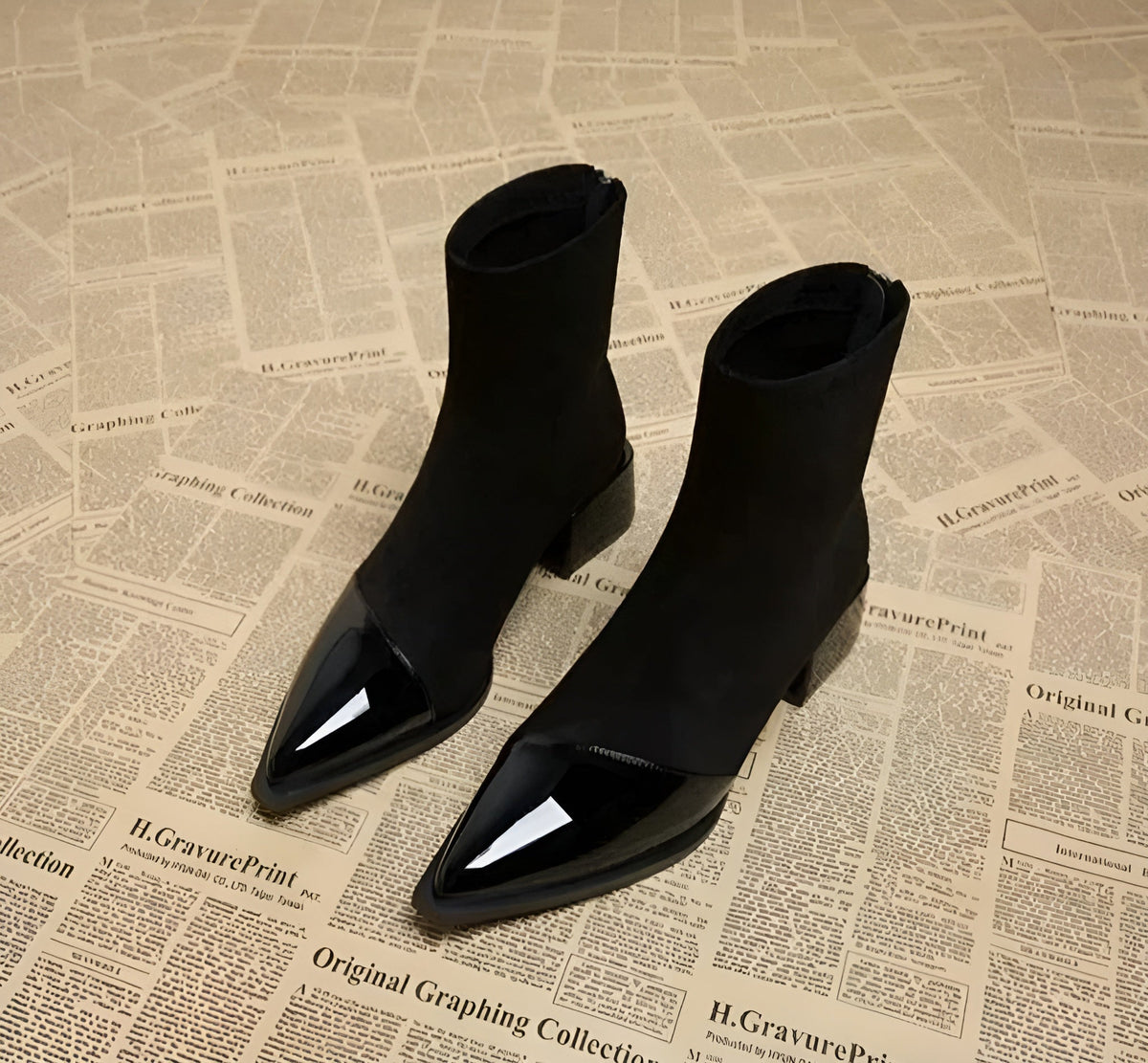 Suede-look ankle boots in black with patent toe panel and block heel, side view