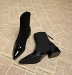 Suede-look ankle boots detail showing the side zip entry