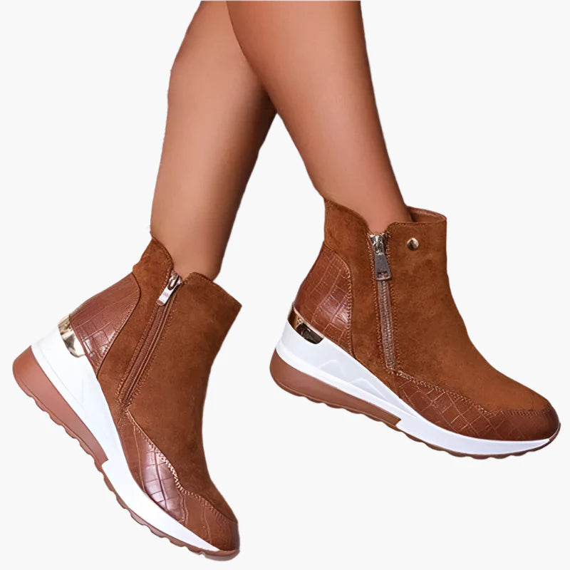 Beige orthopedic ankle boots detail of the cushioned wedge sole