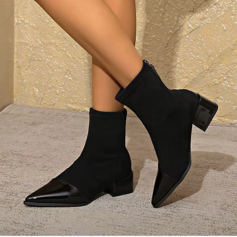 Suede-look ankle boots detail showing the non-slip rubber outsole