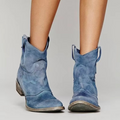 Western ankle boots in blue with pointed toe and low block heel, side view.