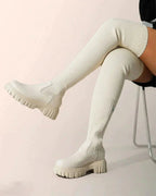 Knit knee-high boots ribbed stretch in black, styled with an outfit