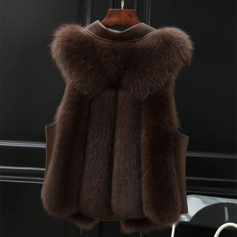Faux-fur gilet layering detail with soft inner lining