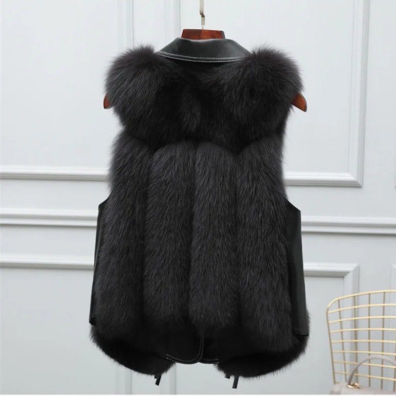 Faux-fur gilet with adjustable waist ties, close-up of texture