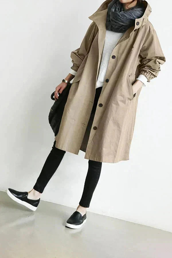 Rain coat oversized hood, shown in grey, black, navy, green, beige, red, turquoise and pink.
