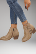 Beige laser-cut comfort boots with breathable upper, side view