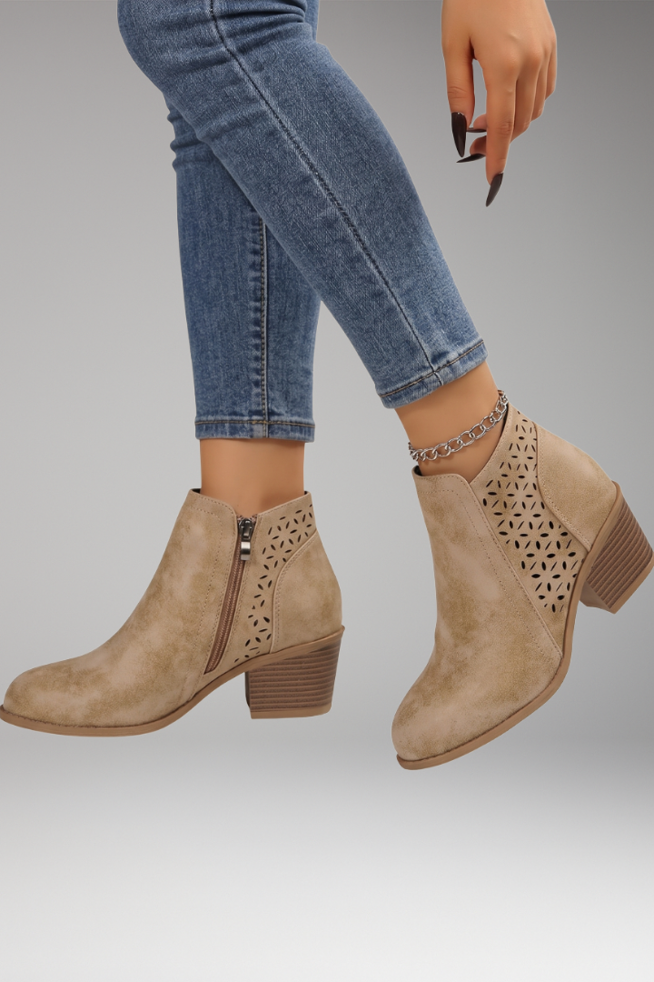 Beige laser-cut comfort boots with breathable upper, side view