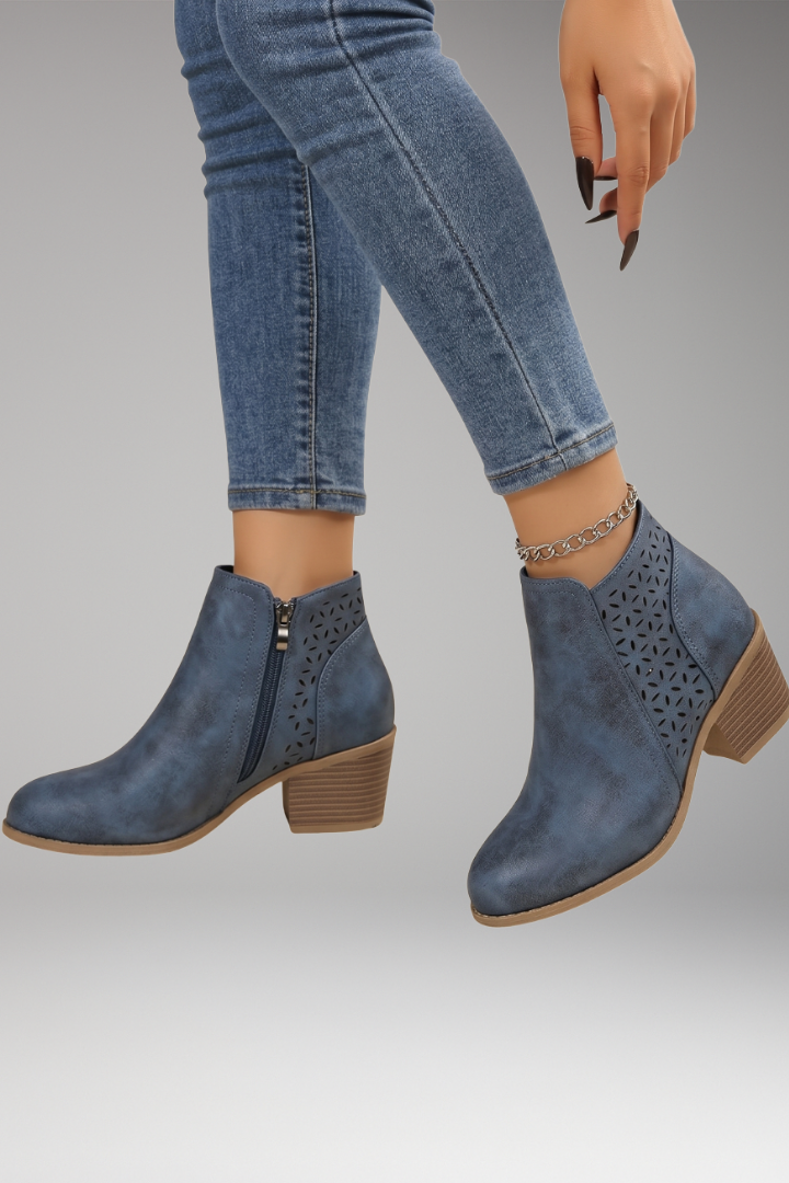 Blue laser-cut comfort boots with breathable upper, side view