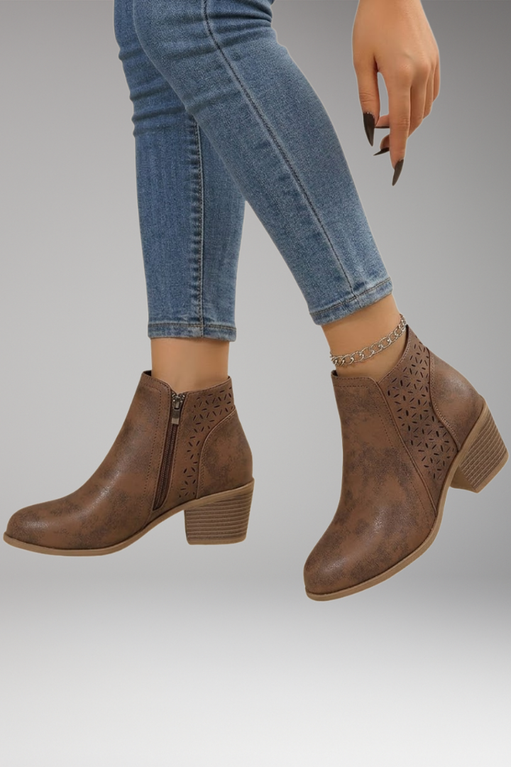 Brown laser-cut comfort boots with breathable upper, side view