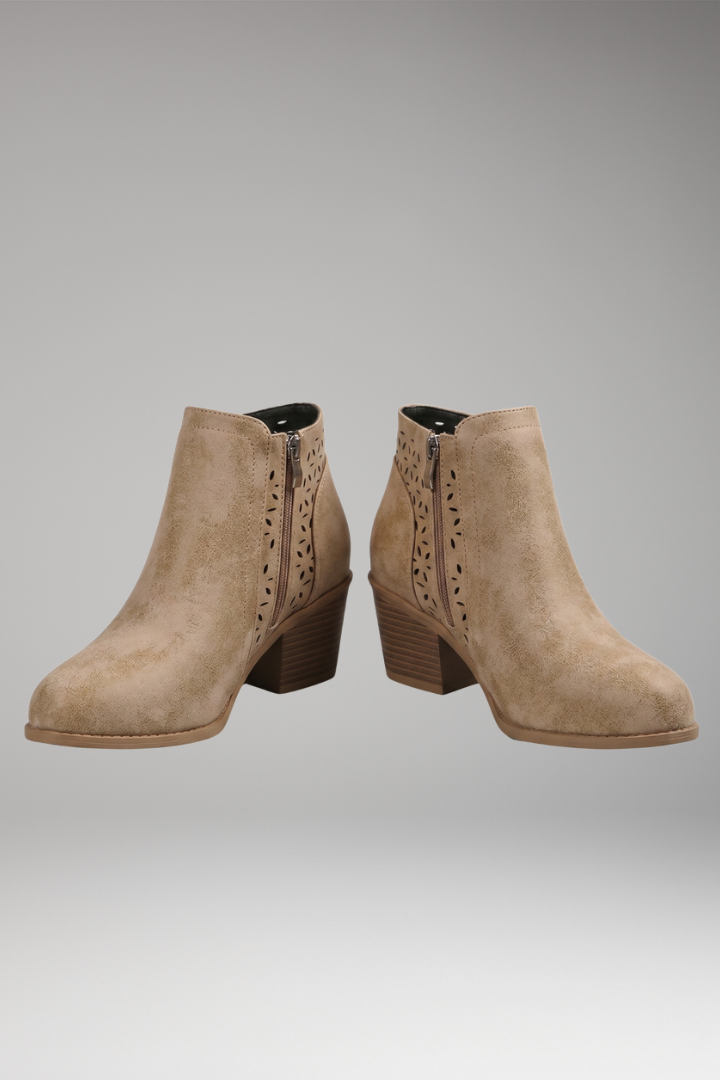 Laser-cut comfort boots with breathable upper, pair shown together